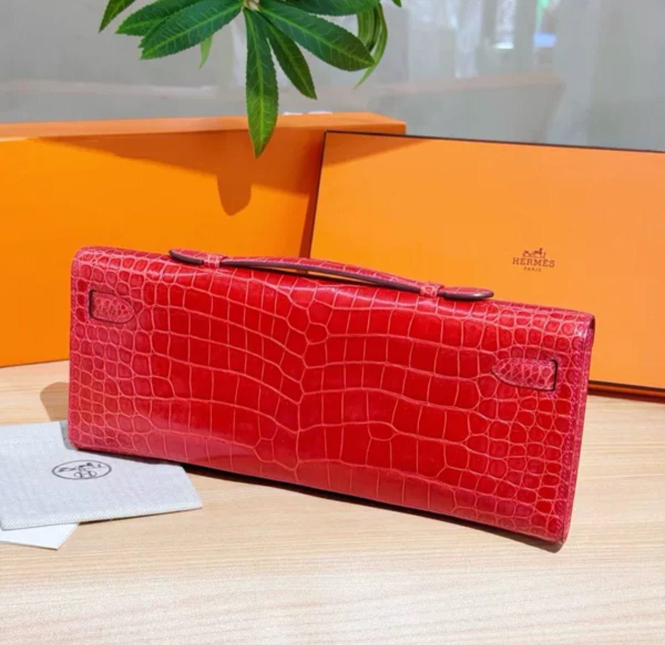 Hermes Kelly cut red shiny crocodile leather palladium hardware