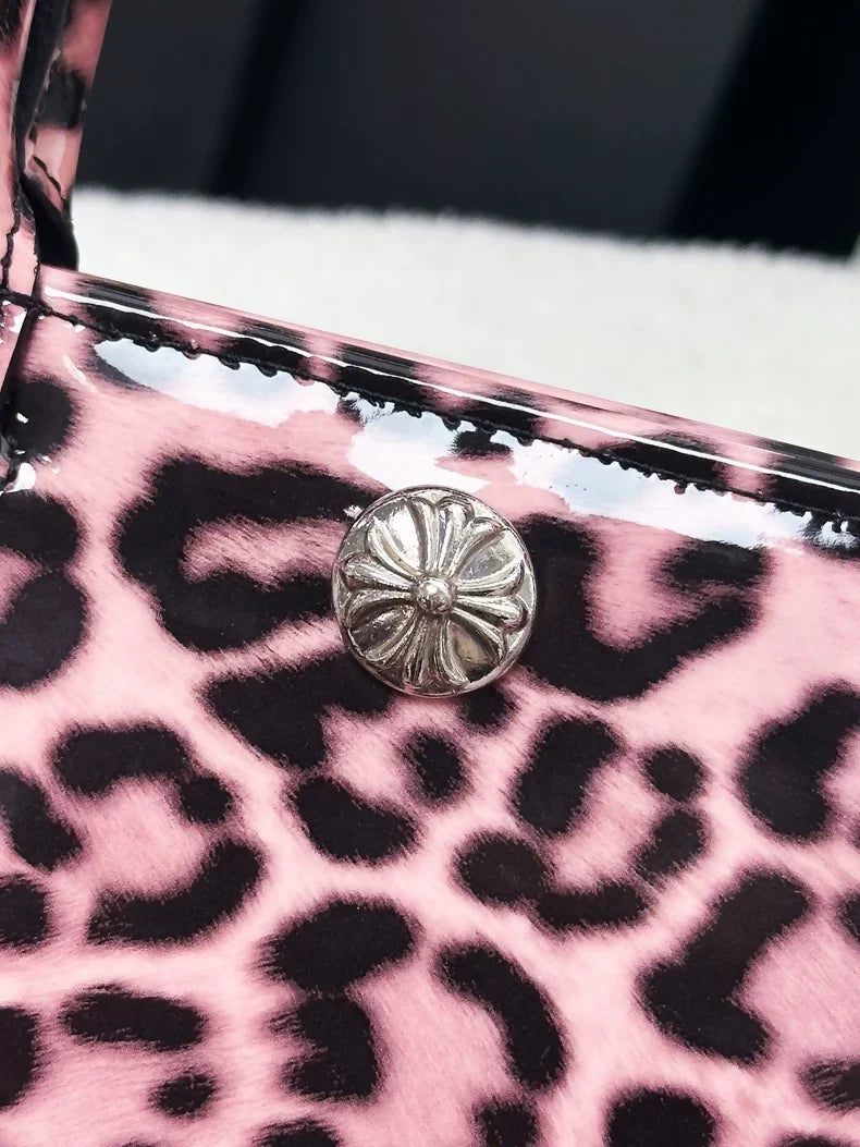 Chrome Hearts mini handbag in pink patent leather with leopard print