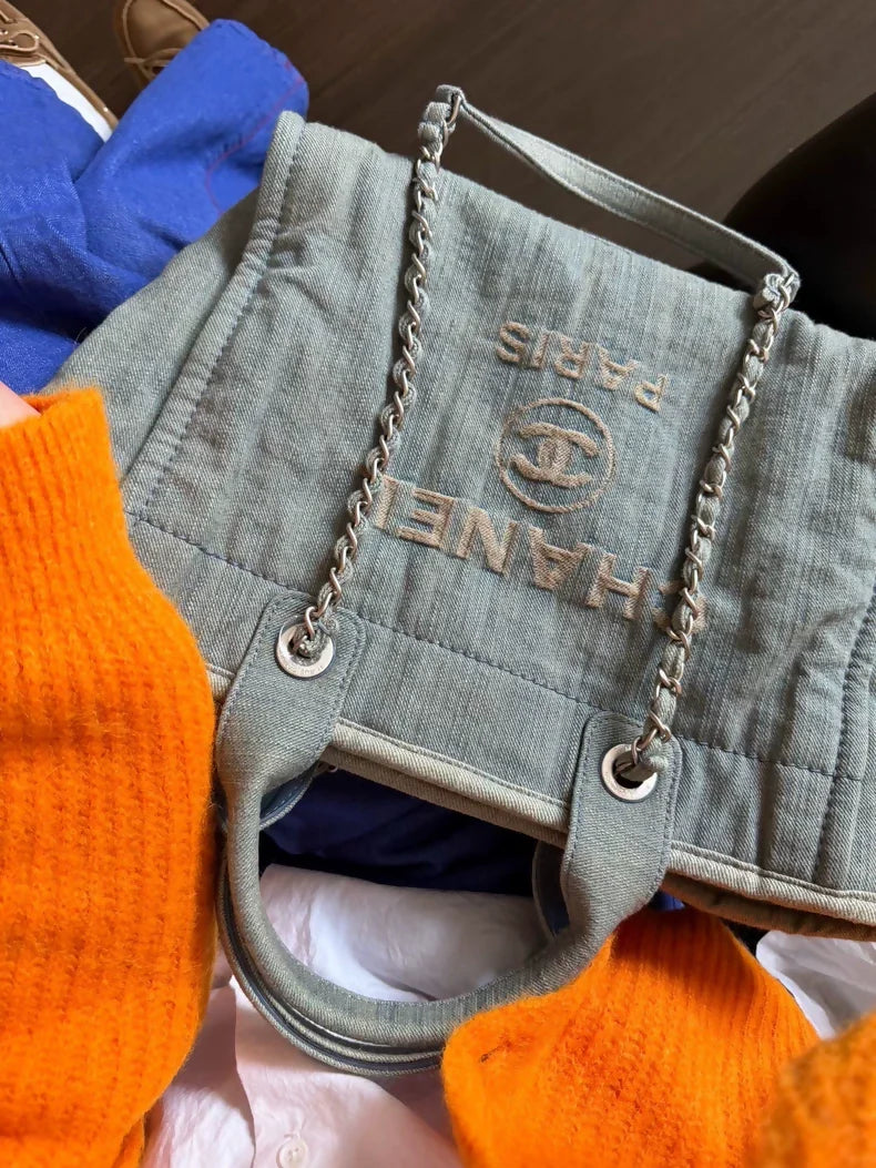 Chanel 23s beach bag in faded and distressed denim, small size