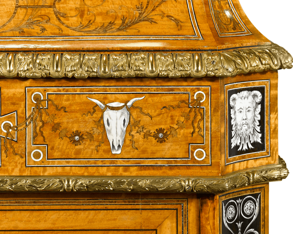 The intricate inlay displayed on this side cabinet is the work of an accomplished artisan