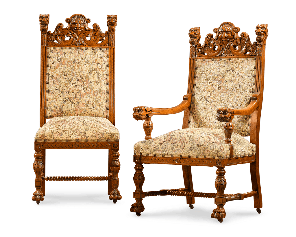 Chairs are covered in a lovely tapestry and carved with masks and lions