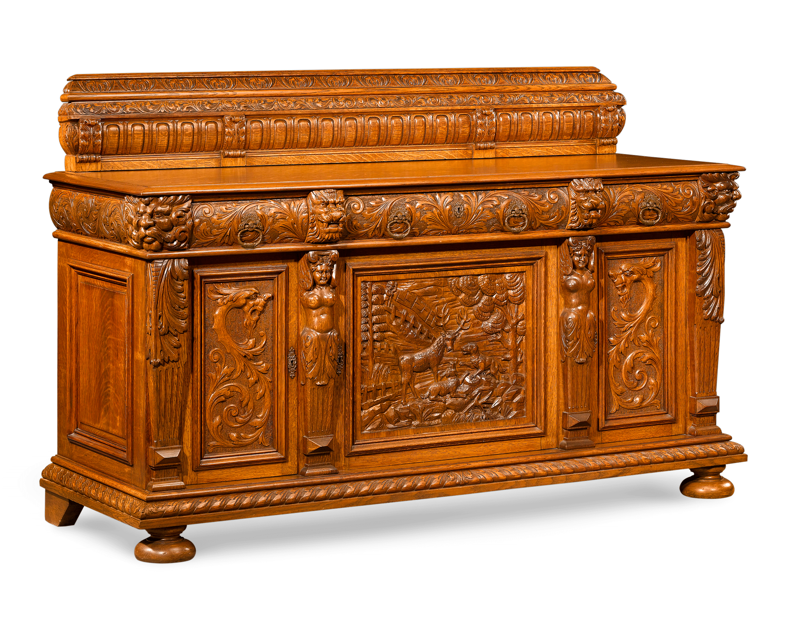 A superb carved hunt scene is the focus of this amazine sideboard