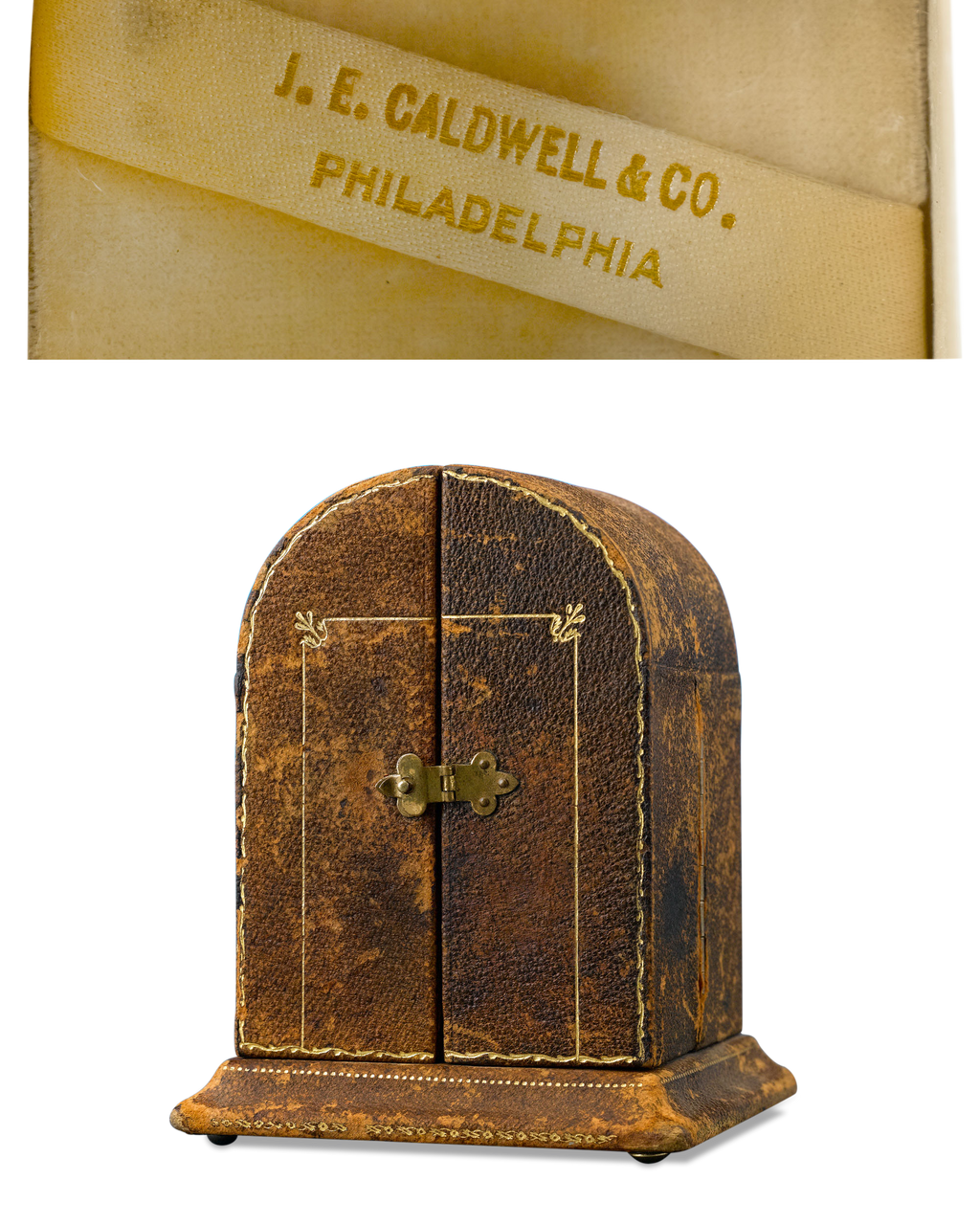 The clock is housed in its original, signed leather case