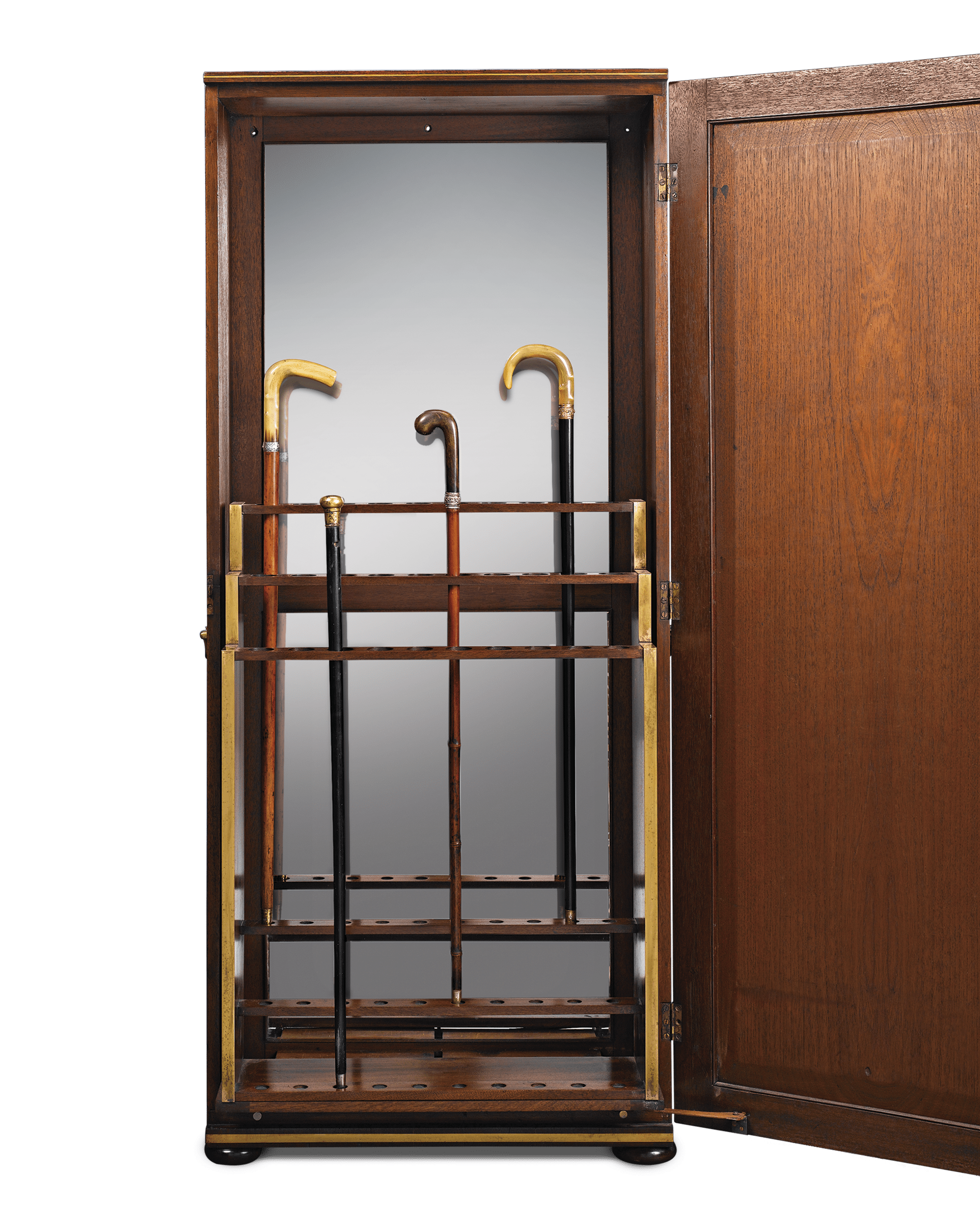 The cabinet's three-tiered rack slides forward as the door opens