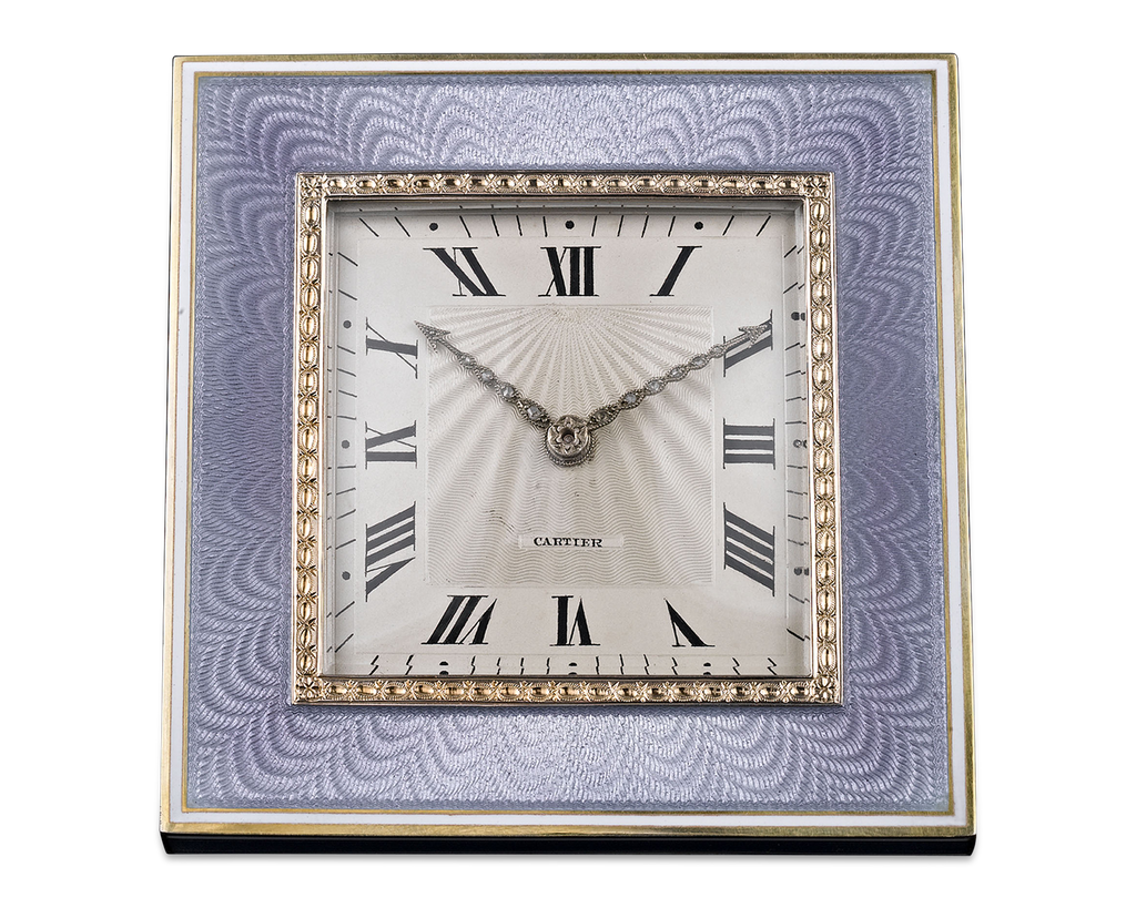 Soft blue guilloché enamel distinguishes this Art Deco-period Cartier desk clock