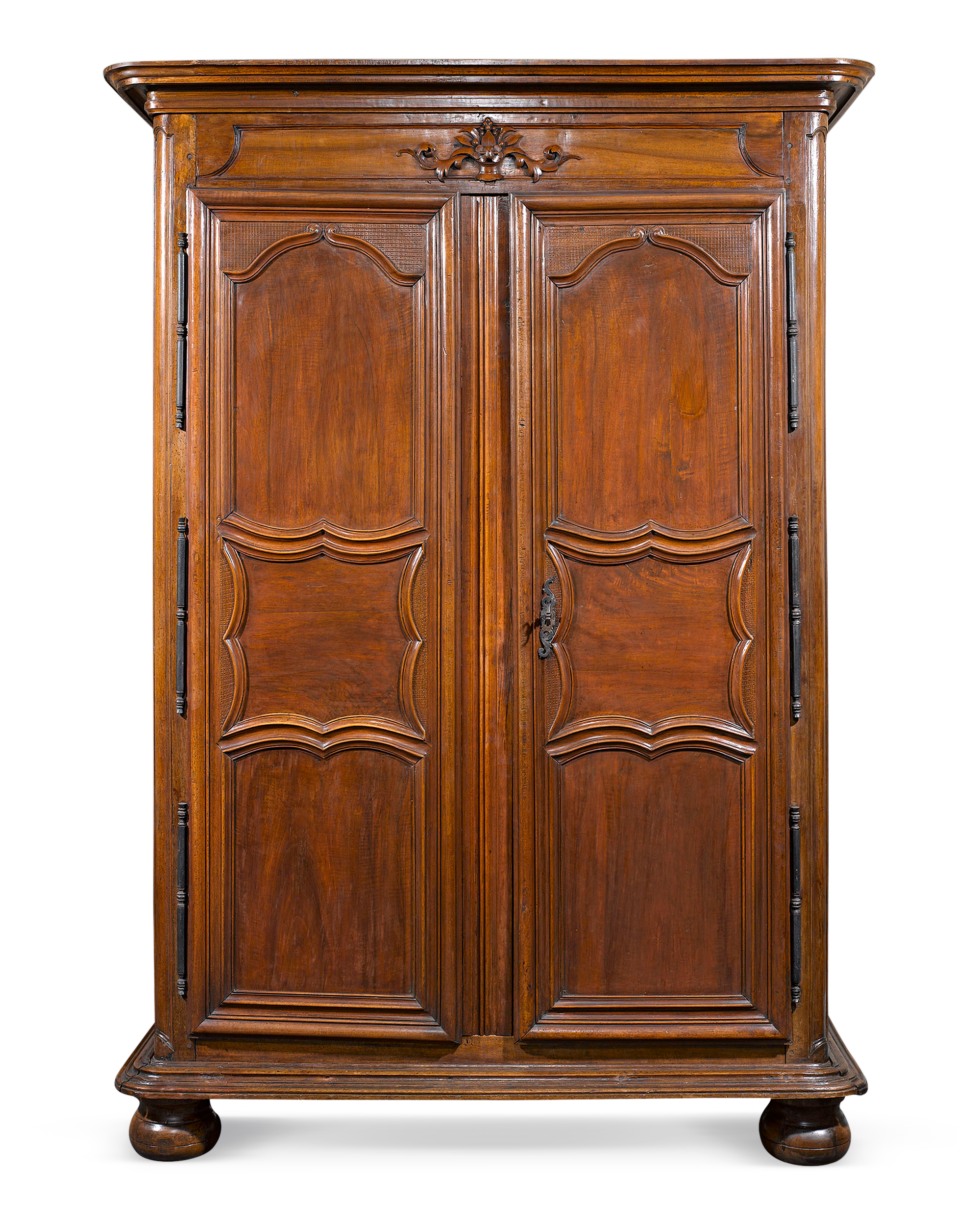 This elegant French armoire exemplifies the beauty of Provincial furnishings