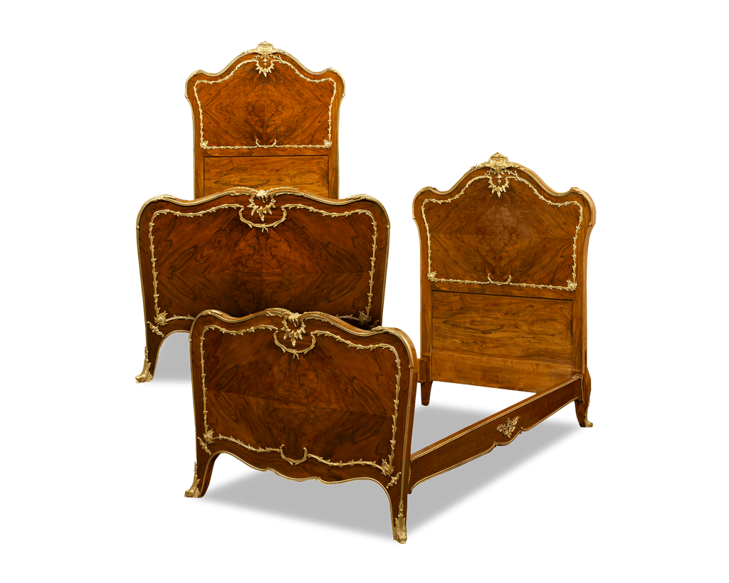 Each mahogany bed bears the hallmarks of Linke's unique style