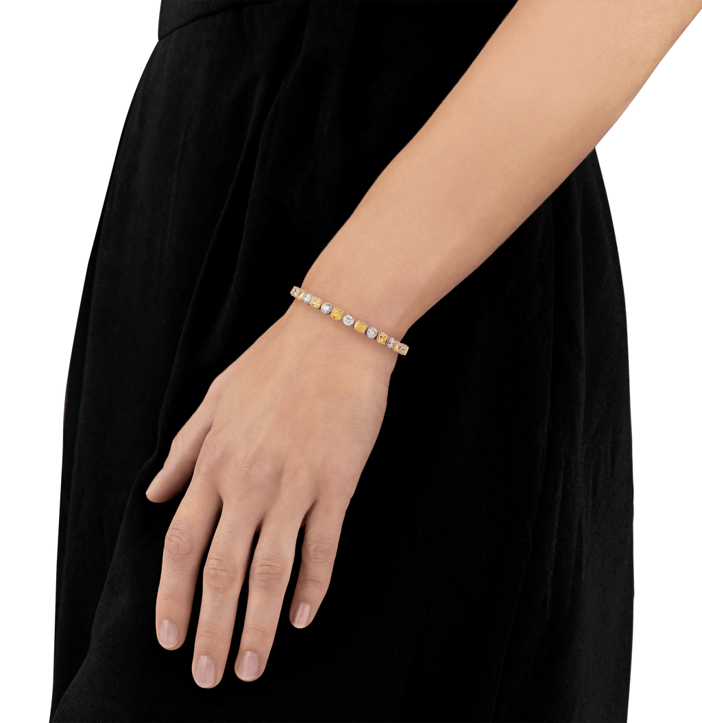Fancy Light Yellow and White Diamond Tennis Bracelet, 21.63 Carats