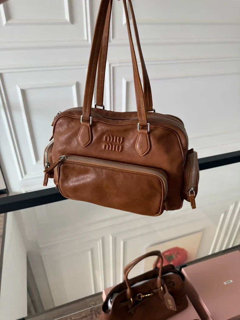 Miu Miu's Spring/Summer 2024 vintage style brown tote