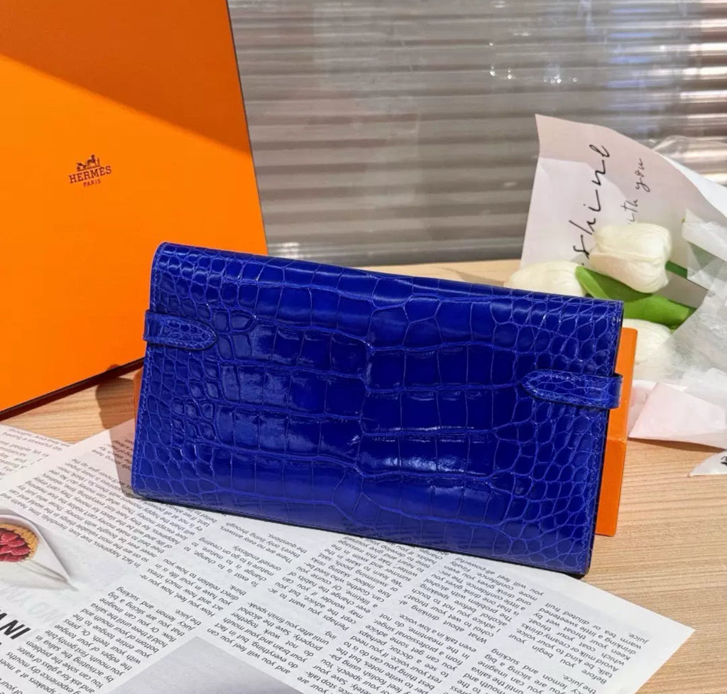 Hermès Kelly long electric blue shiny crocodile leather gold hardware