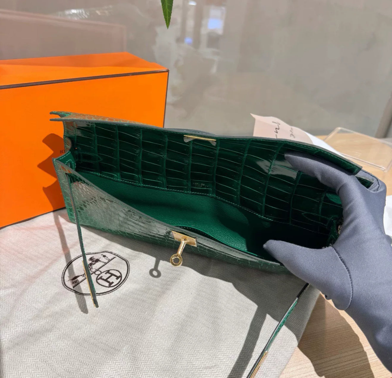 Hermes Kelly Cut Shiny emerald crocodile Leather Gold Hardware