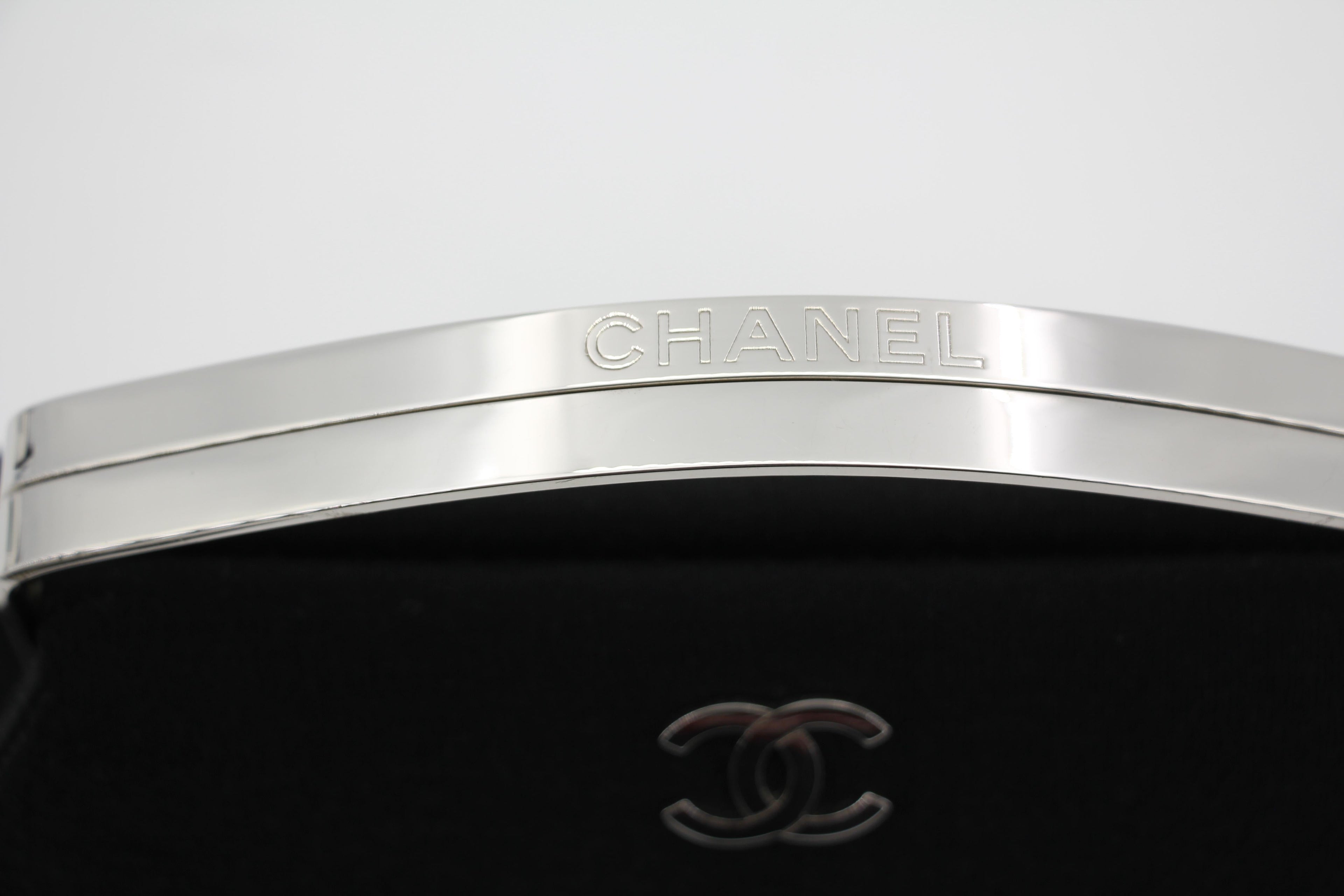 Chanel vintage black clutch with silver hardware handle