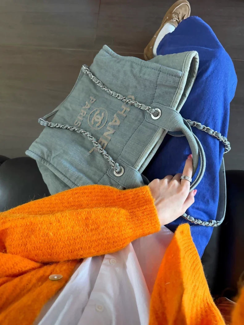 Chanel 23s beach bag in faded and distressed denim, small size