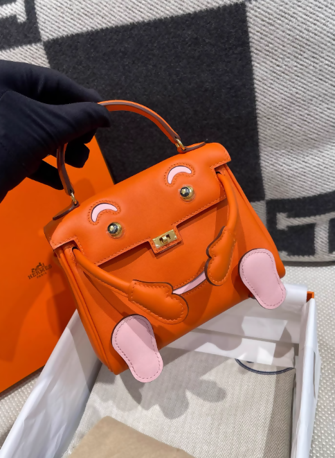 Limited Edition Hermes kelly doll Orange Rose Sakura Swift leather with Gold Hardware