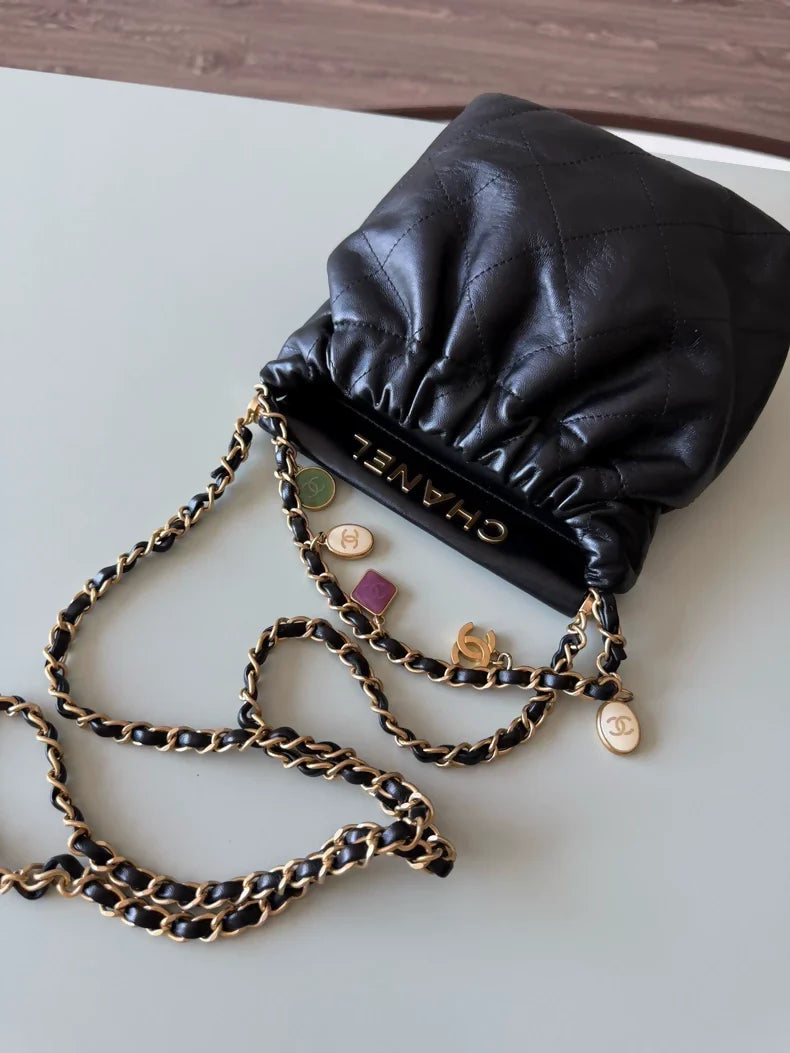 Chanel 23P black leather bag with Charms