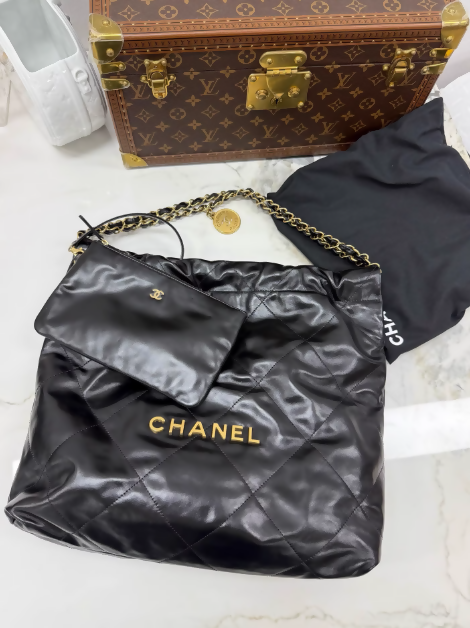 Chanel 22 bag black gold medium