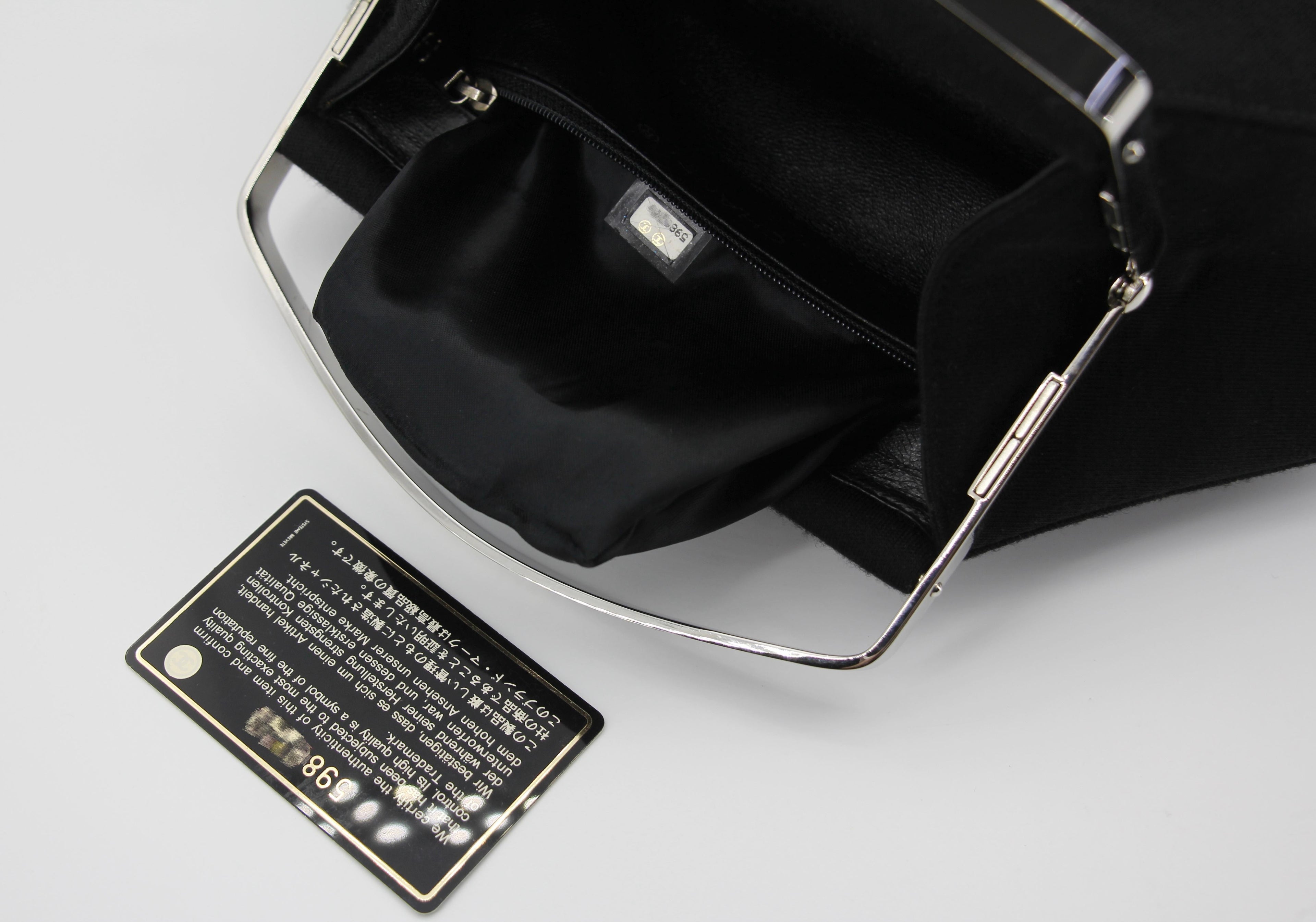 Chanel vintage black clutch with silver hardware handle