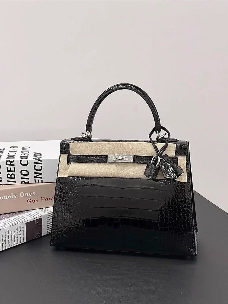 Hermès Kelly 25 black shiny crocodile leather palladium hardware