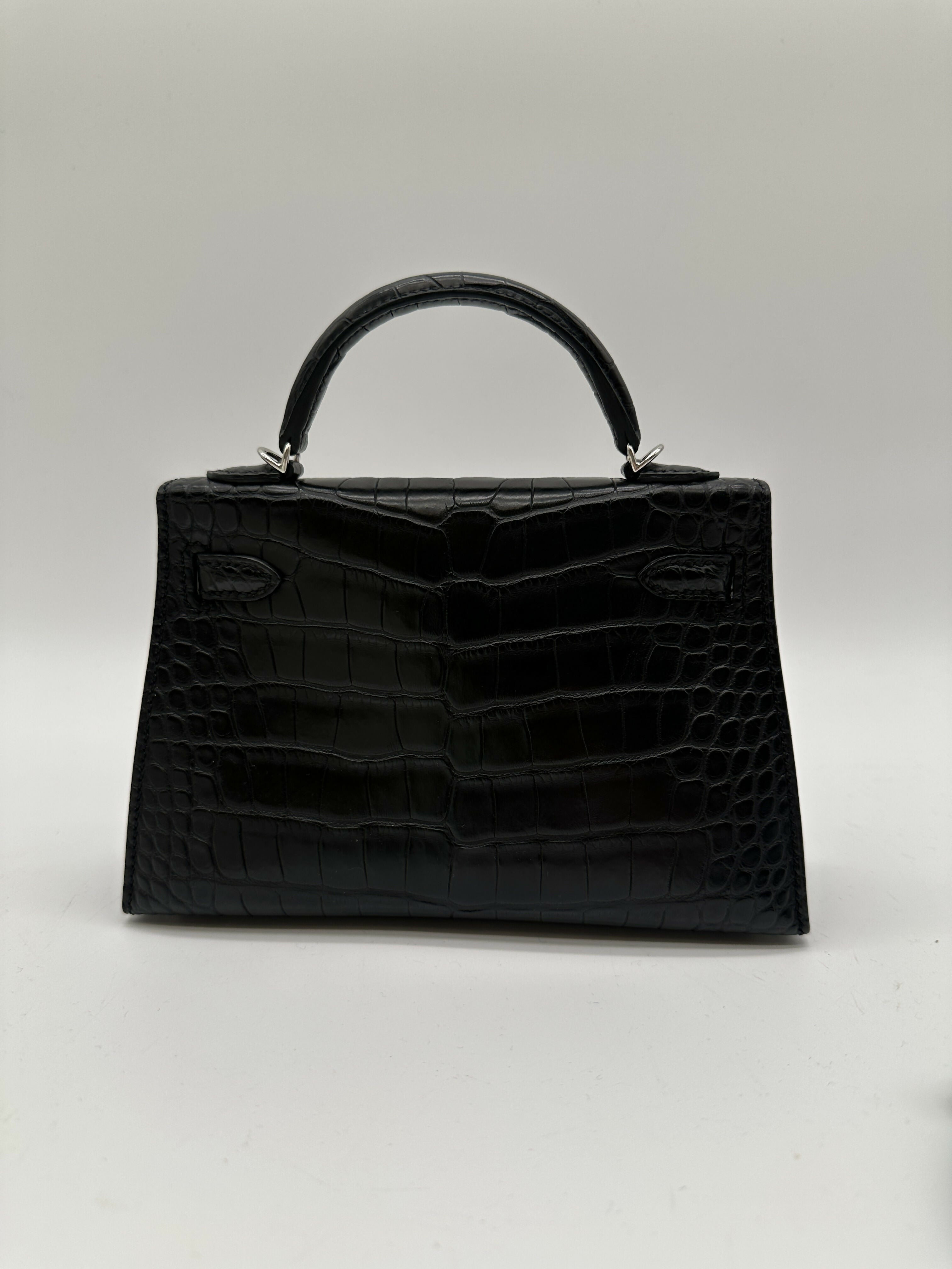 Hermès Kelly 20 Black Matte Alli Missi PHW B 2023