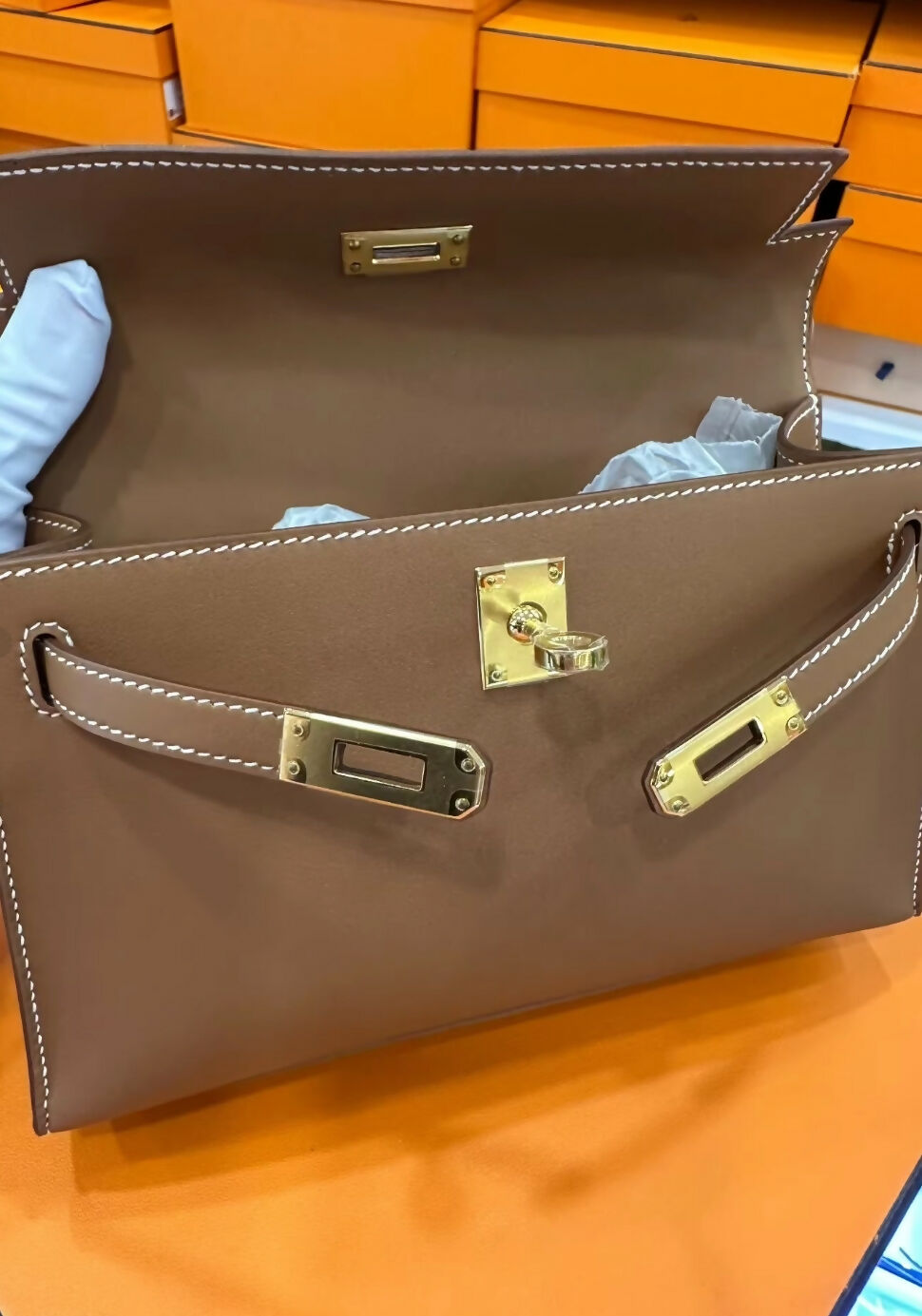Hermès Kelly Pochette Gold Swift leather Gold hardware