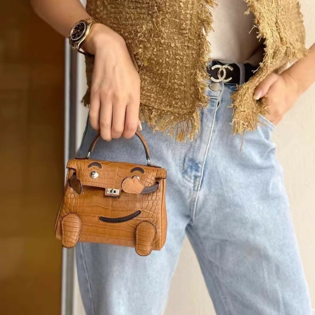 Hermès Quelle Idole Kelly Doll Matte Gold Alligator and Ebene Swift Palladium Hardware