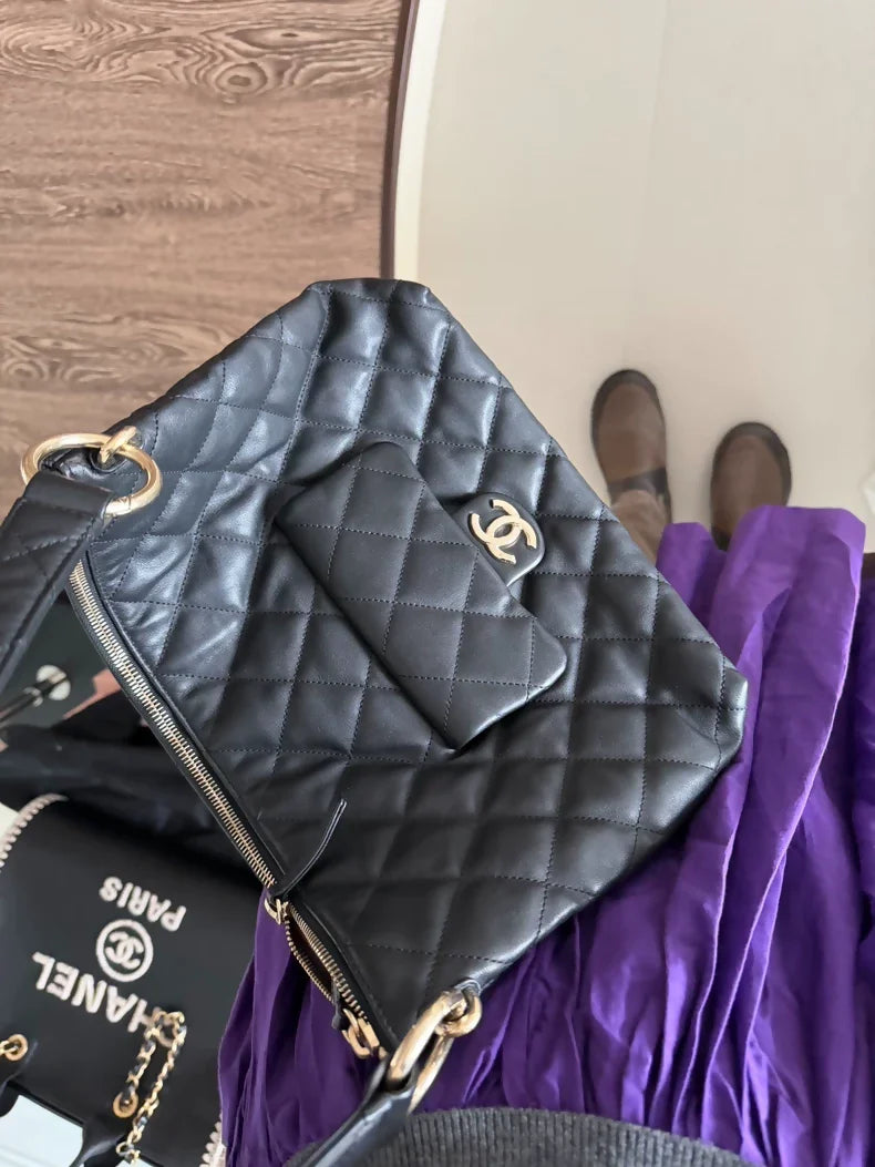 Chanel 23B hobo bag, black and gold, small size