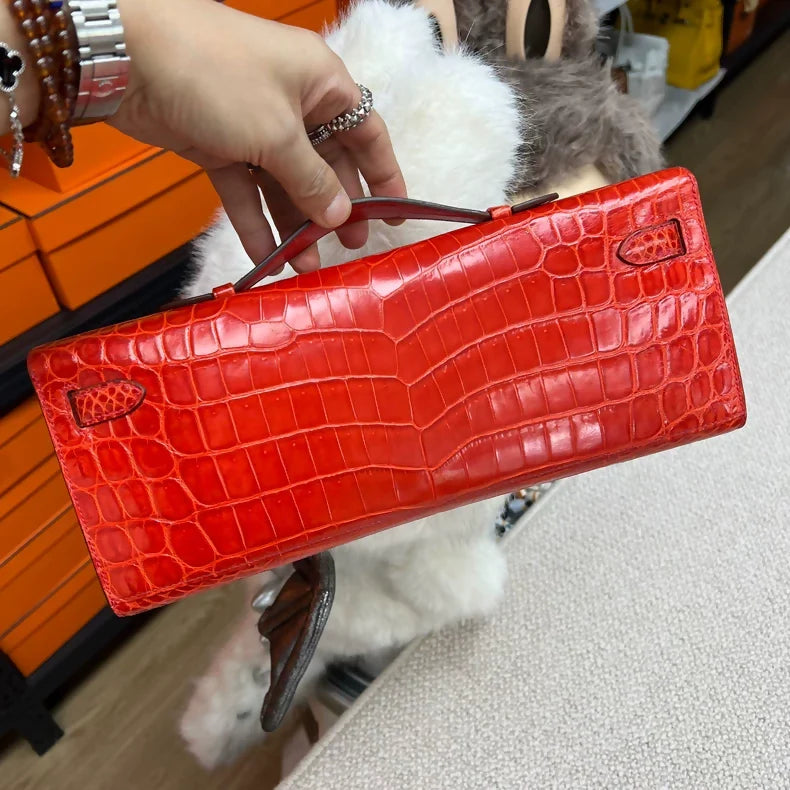 Hermès Kelly Cut D5 red shiny crocodile palladium hardware