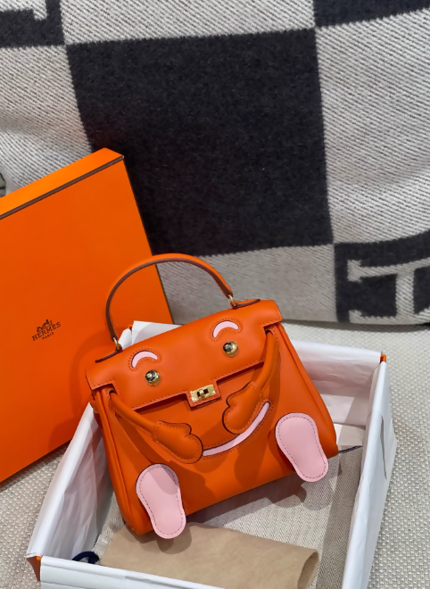 Limited Edition Hermes kelly doll Orange Rose Sakura Swift leather with Gold Hardware
