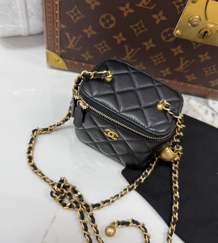 Chanel 25A Golden Ball Mini Case Bag