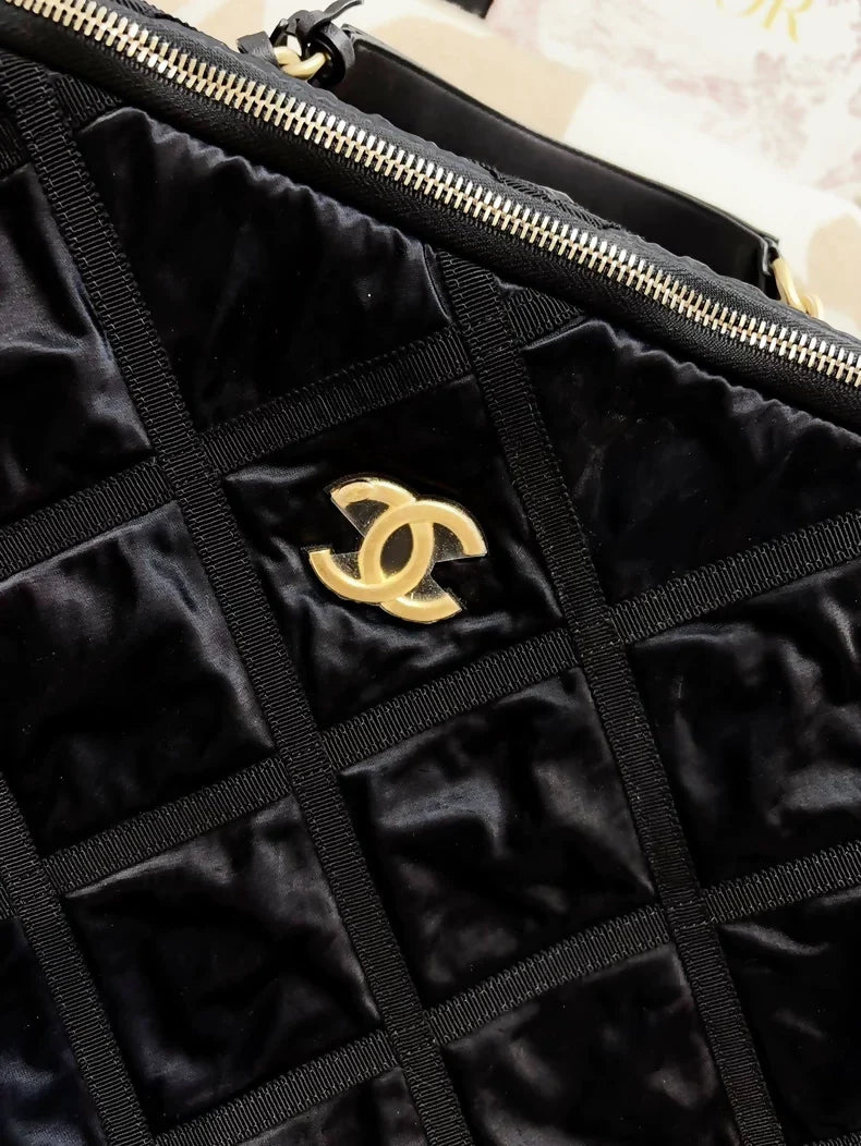 Chanel 22P travel box in black quilted nylon