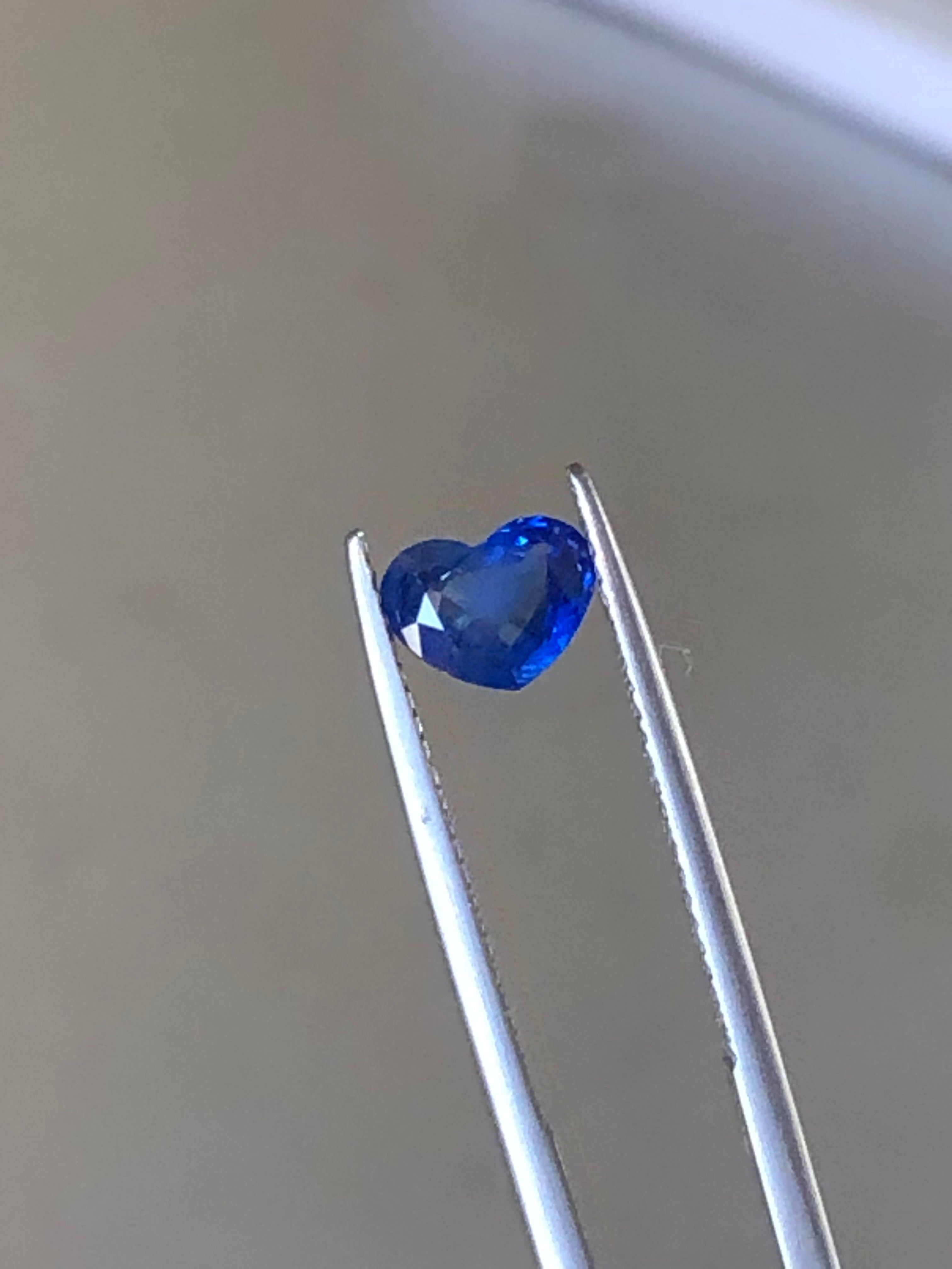 0.87 carats Heart Shape Royal Blue Sapphire