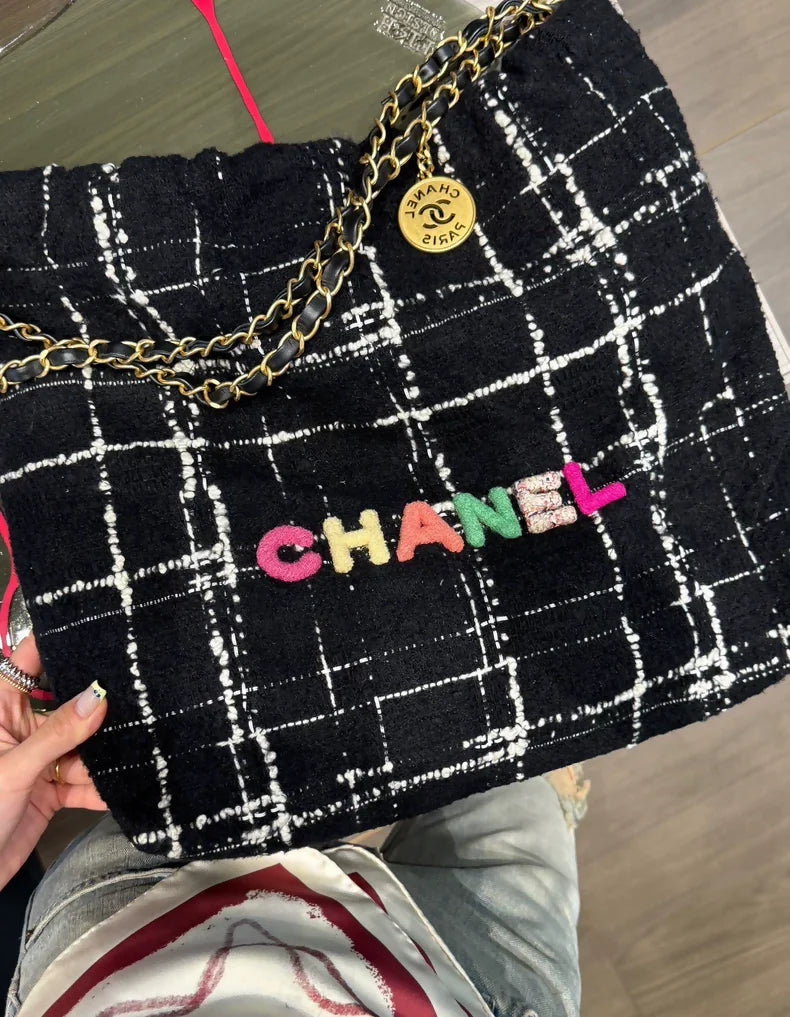 Chanel 22k tweed bag with Multicolor CC letters medium size