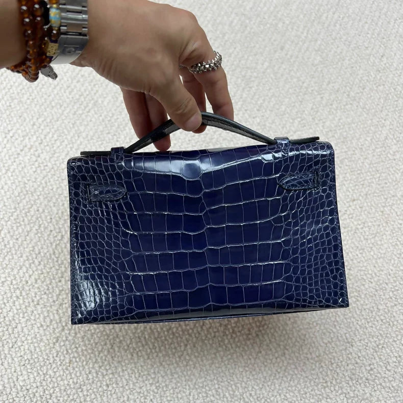 Hermès Kelly pochette M3 Blue shiny crocodile leather gold hardware