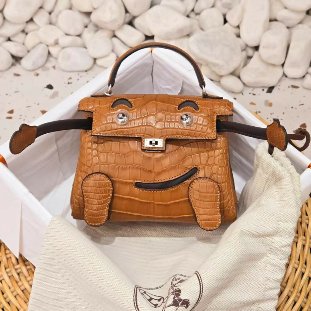 Hermès Quelle Idole Kelly Doll Matte Gold Alligator and Ebene Swift Palladium Hardware
