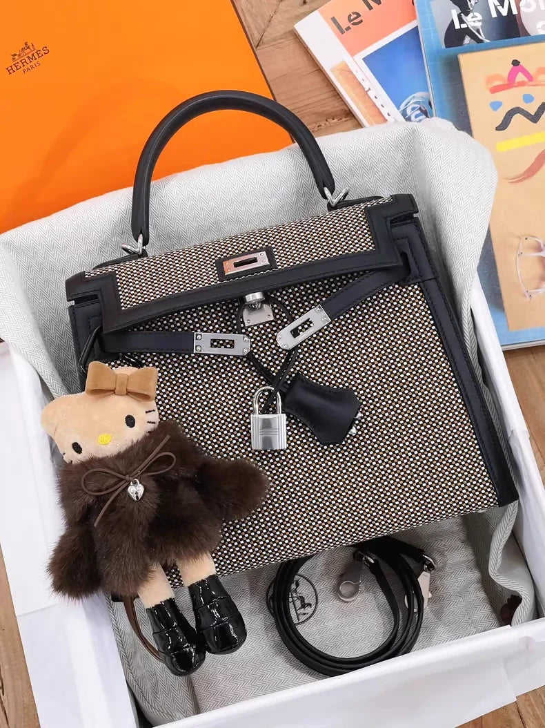 Hermès Kelly 25 black leather with brown and white embossed canvas palladium hardware