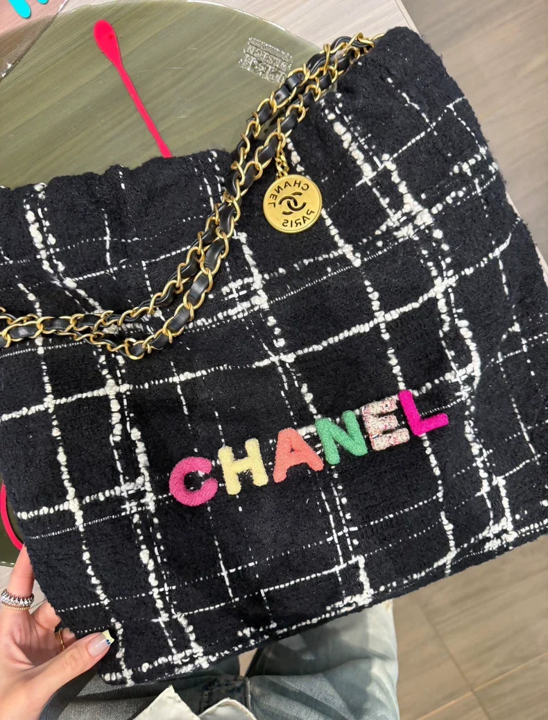 Chanel 22k tweed bag with Multicolor CC letters medium size